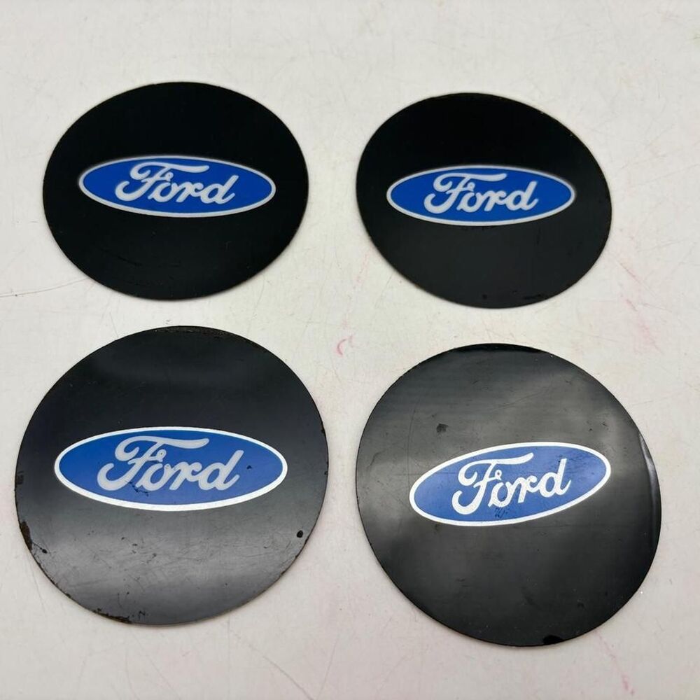 Ford center caps with blue oval logo